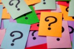 Colourful post it notes with question mark symbol