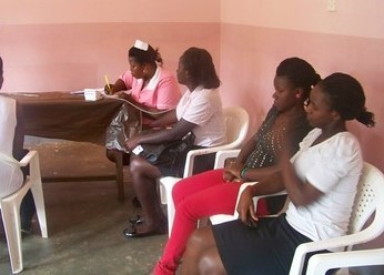 © "Students que up for tests before accessing the Cervical Cancer Screening service