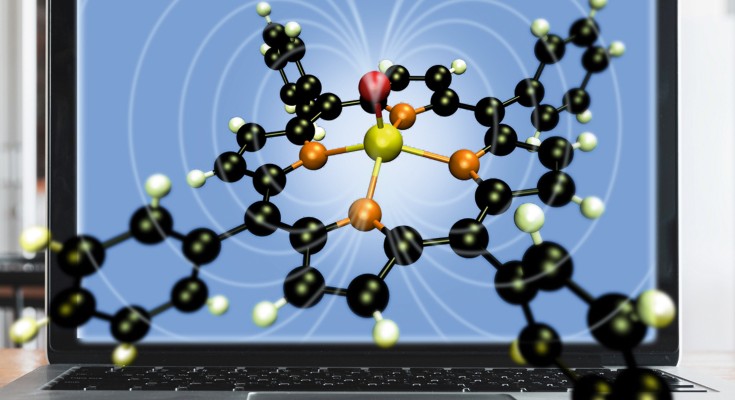 A typical single molecule magnet with its associated field lines is shown emerging from a computer screen