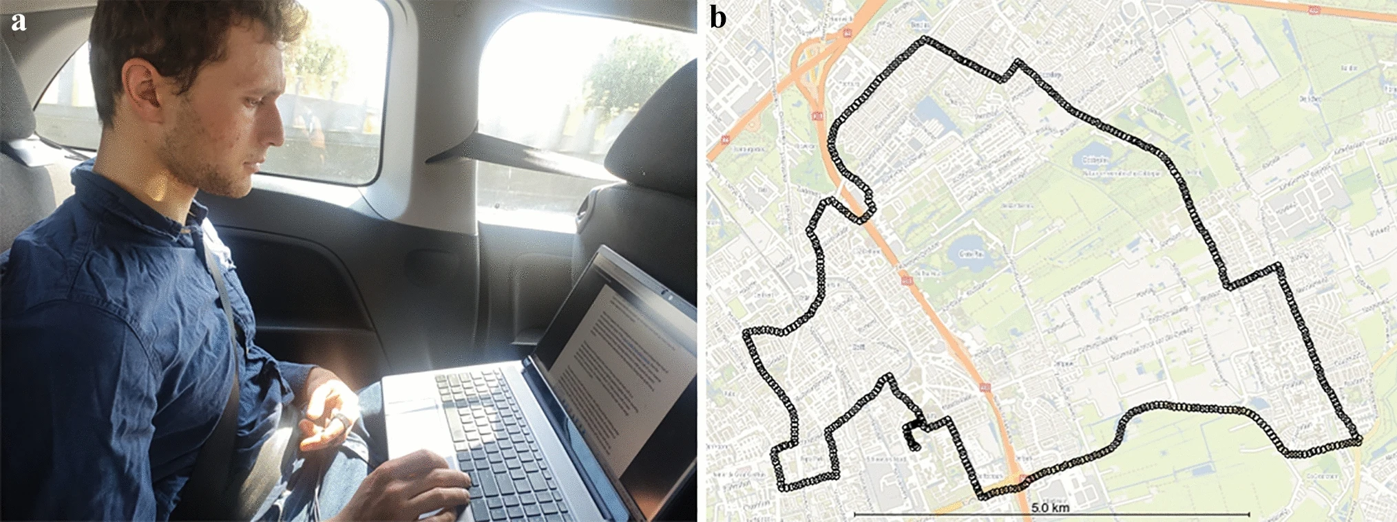 image of someone working on a laptop in the back of a car, with a route drawn on a map of Delft
