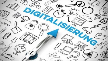 Ein Zeiger deutet auf das Wort Digitalisierung, drumherum befinden sich gezeichnete Digitalisierungssymbole.