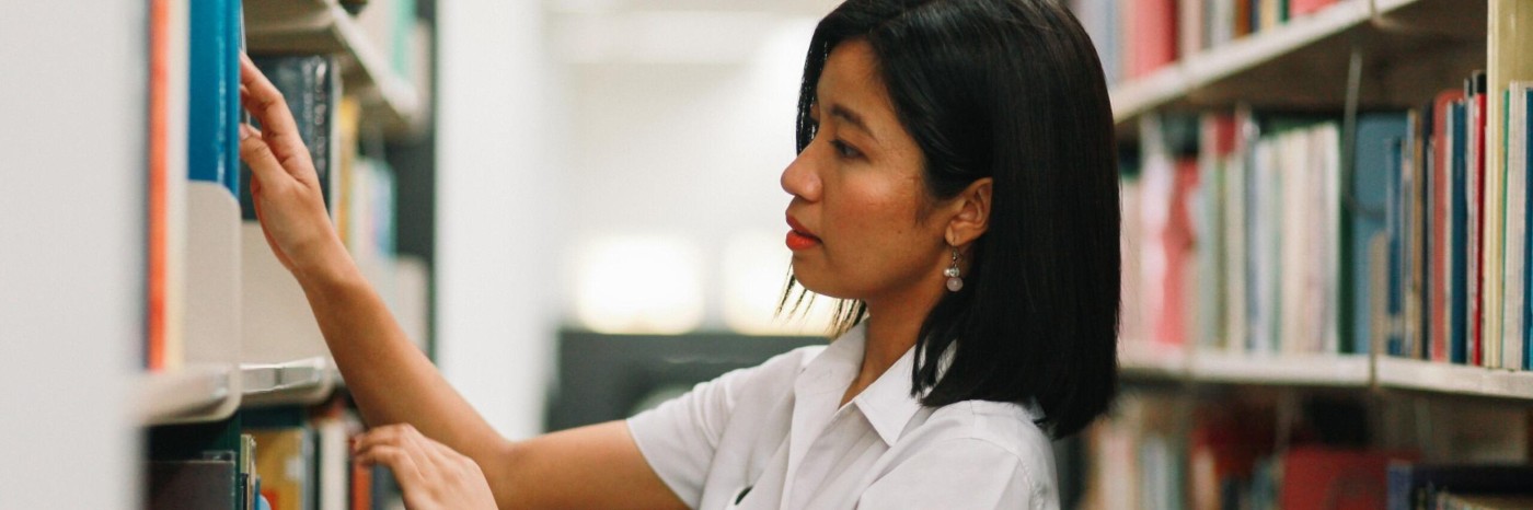 Academic searches for a journal in library shelves