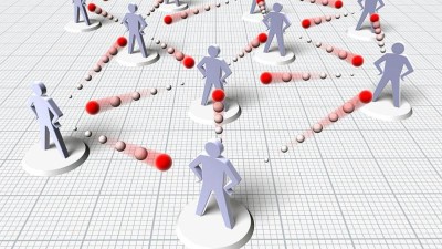 Männchen stehen durch Punktlinien in Verbindung miteinander