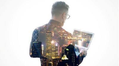 Geschäftsmann mit Laptop