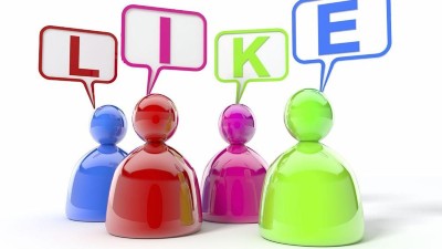 Spielfiguren, die das Wort "Like" buchstabieren