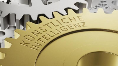 Zahnrad mit der Aufschrift Künstliche Intelligenz