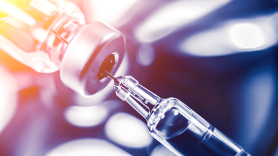 Photograph of a syringe and glass vial