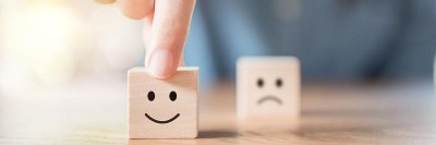Drei Würfel mit Smileys