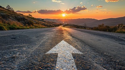 Arrow on winding road