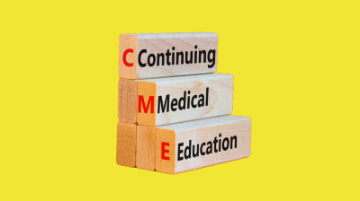 Holzklötze mit den Worten Continuing Medical Education
