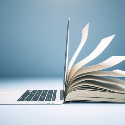Laptop und Buch in einem