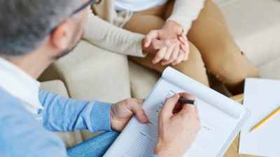 Psychotherapeut mit Patientin