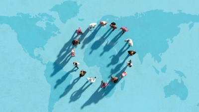 Image is a digitally generated group of human figures placed in a circle on a blue world map as the background to illustrate the concept of solidarity or consensus