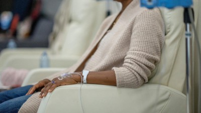 Woman receiving an intravenous infusion