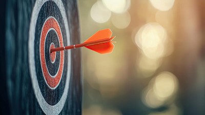 Dart hitting center of target