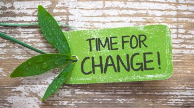 Grüner Zettel mit der Aufschrift Time for Change.