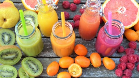 Colourful selection of fruits and juices