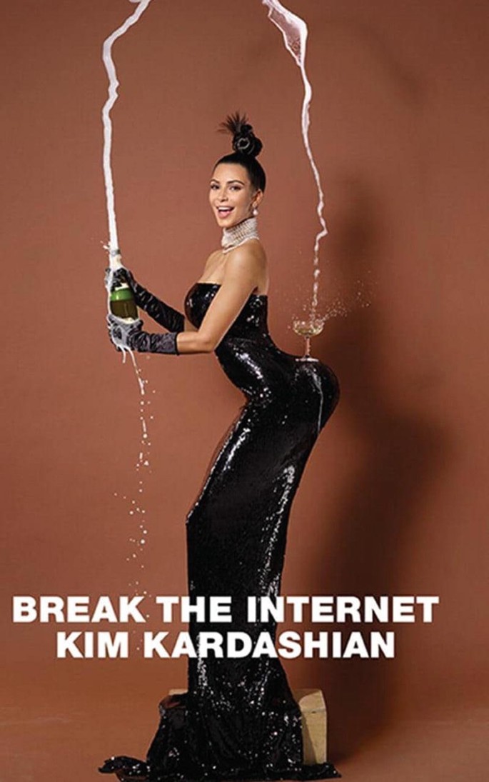 A photograph with the side view of a woman opening a bottle of champagne. The champagne gushes out over her head and fills the flute placed on her back. The caption reads, break the internet, Kim Kardashian.