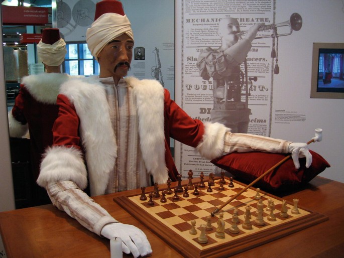 World chess champion Garry Kasparov walks around the playing room as he  waits for IBM's Deep Blue chess playing computer to make its next move  during the third game of their six