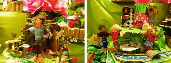 Two photographs of a model, with clay and peg characters standing by the side of clean and neatly built houses. Plants and flowers are in the foreground by a stream.