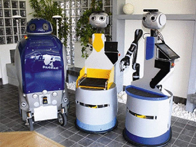Three photographs of different robots.
