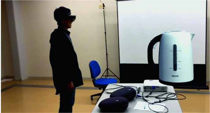 Sharing Augmented Reality Experience Between HMD and Non-HMD User |  SpringerLink