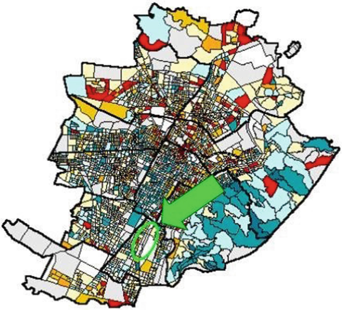 A map of Turin City. The arrow and the encircled location indicate the M O I area.