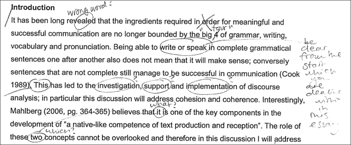 An excerpt from a corrected linguistic analysis. It has a paragraph under the header introduction. A handwritten remark on the right reads, be clear from the start which you are dealing with in this essay.