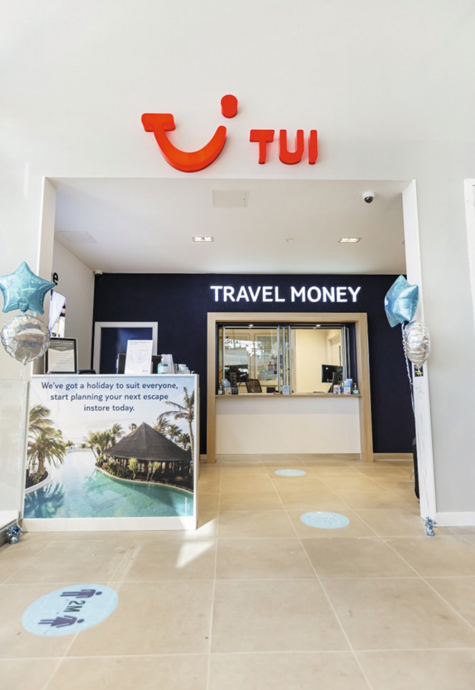 A photograph of a retail store of the T U I group.