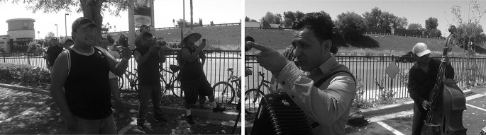 A collage of two grayscale photos. The left has a group of men who hold their phones in front of their faces. The right has a closeup of a man who points his finger to his front. A man behind him plays the cello.