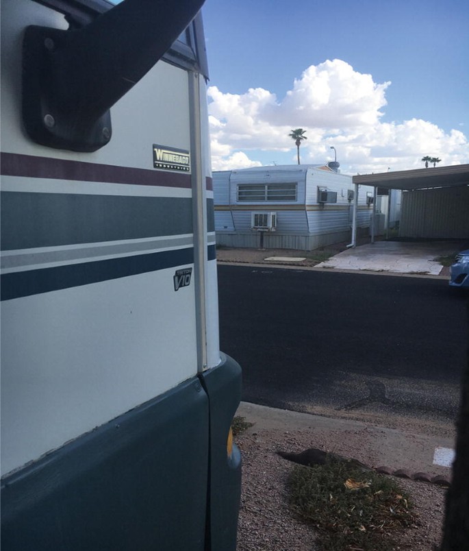 A shot of the mobile homes that line both sides of the road.