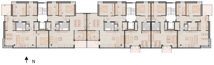 An illustration of the unit floor plan within Klosterenga. The living rooms face south, the bedrooms, north, and the restrooms are in the center.