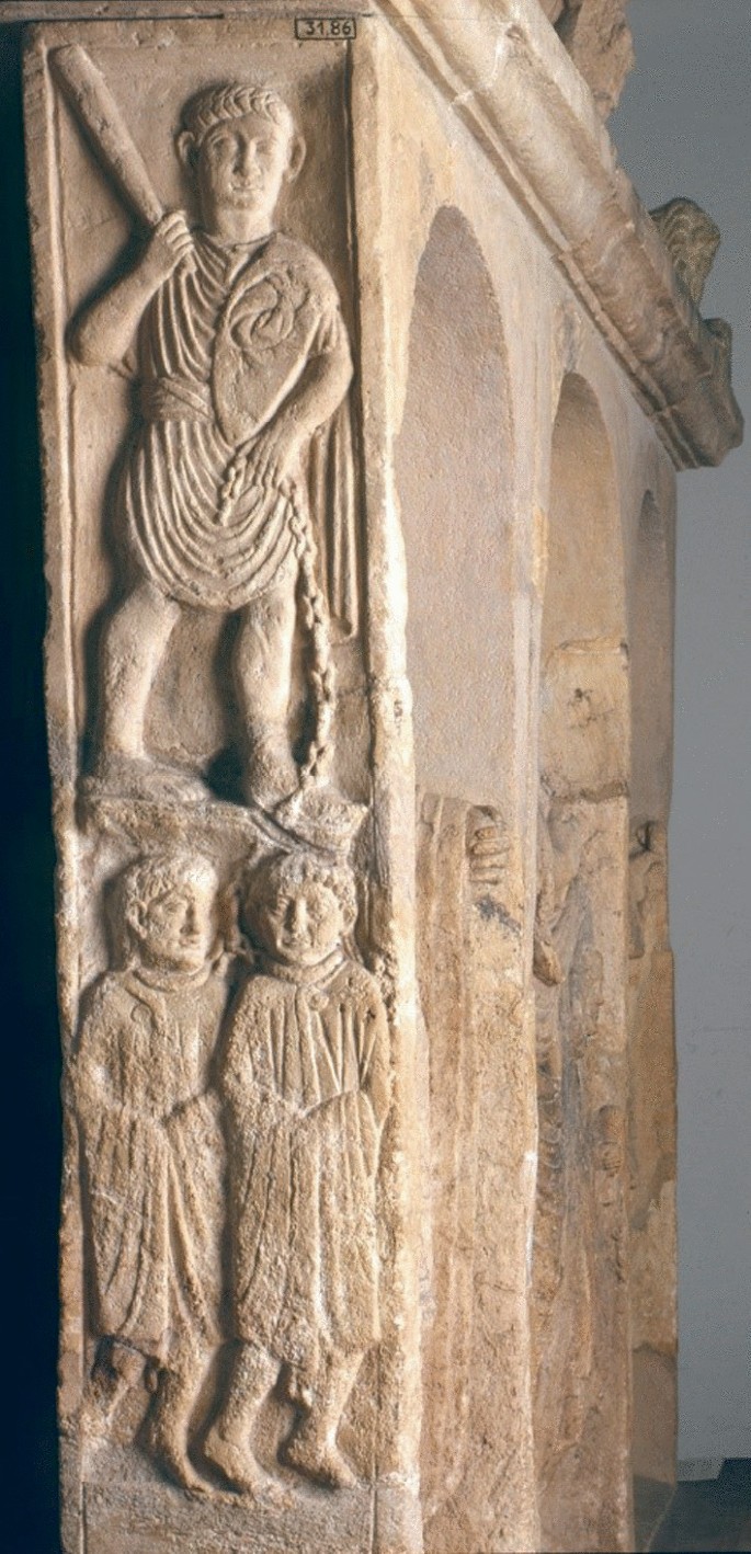 Roman gravestone with relief from Nickenich, Germany. The sculpture exhibits the relief of a Roman trader of enslaved individuals.