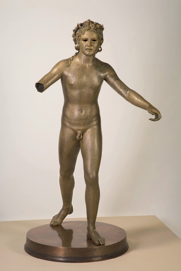 The bronze statue of a nude ephebe from Xanten. The lower part of the right hand of the boy in the statue is missing.