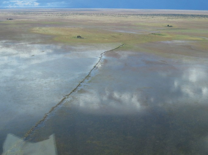 A photograph of an aerial view across the Bulozi Floodplain with a the majority of the area covered by water.