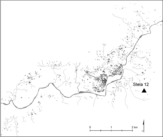 A map of Stela 12. A triangle icon illustrates the location of the archaeological site on the map.