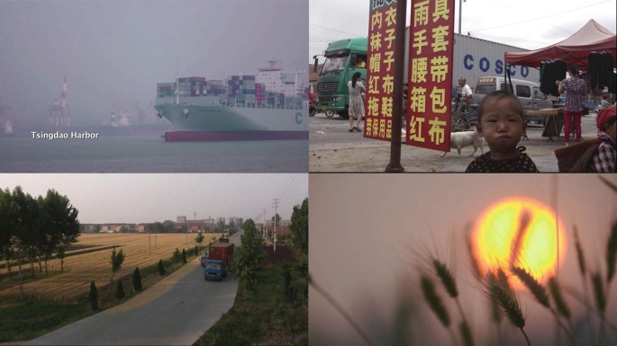 4 Video stills. A long shot of a large vessel in the sea. A marketplace with signage in a foreign language and a small boy standing in the foreground. An aerial view of a truck passing through a long road. A close-up of a few plant stalks against the blurred background of a setting sun.