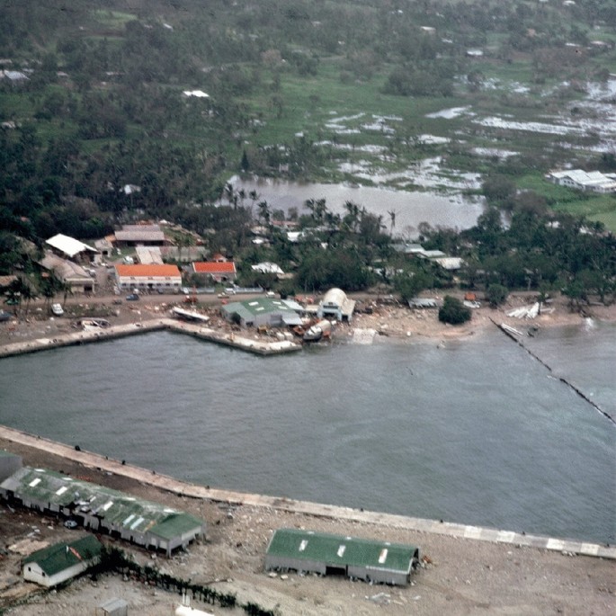 A photograph shows cyclone prone Avatiu port has huge impacts of storm.