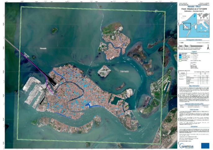A high-resolution photograph of flooding in Venice. The area is surrounded by water on all four sides.