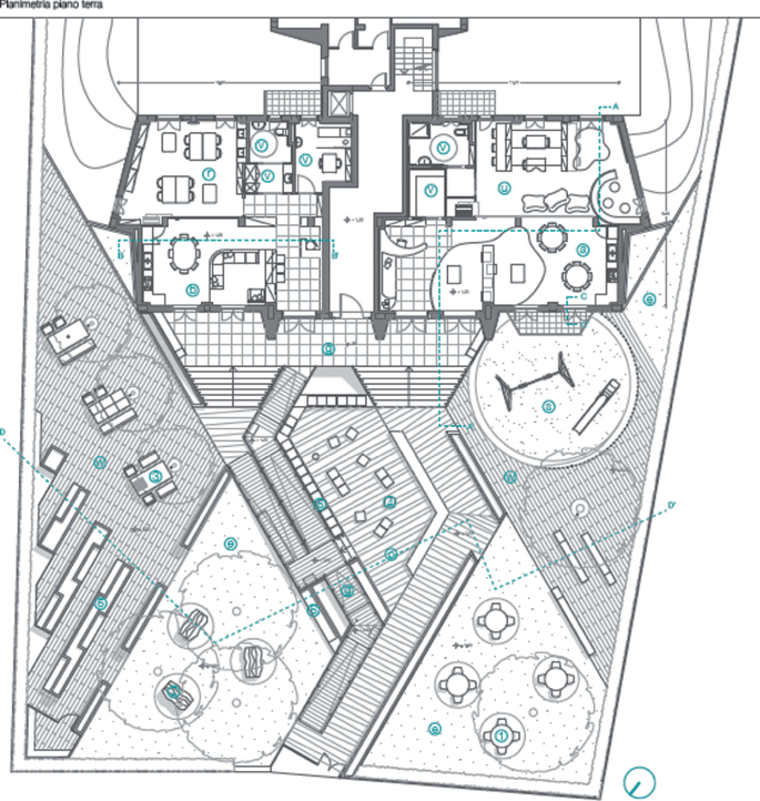 A layout of a floor plan of a flat with a lawn on its front side is titled in a foreign language. Two blocks are on either side of the corridor. Each block has several rooms. Each area is labeled by alphabet.