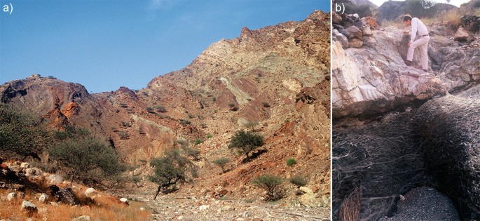 2 photographs. A. A mountainous landscape with sections of trees and shrubs. B features a man in a volcanic terrain.