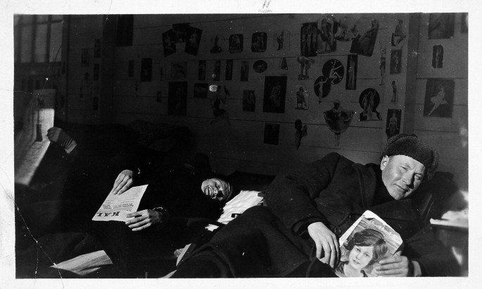 A photograph of patients in the male section of the communal balcony.