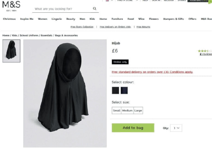 A still of the product page from the M and S website displays a hijab for sale at 6 pounds. The webpage includes options to select the color, size, and information about free standard delivery on orders over 50 pounds. There is a quantity field and an add-to-bag button for the purchase.