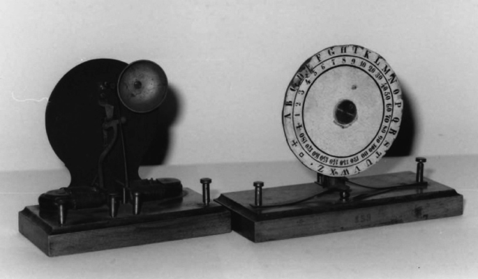 A historical photo of Morse apparatus fixed atop of a rectangular platform.