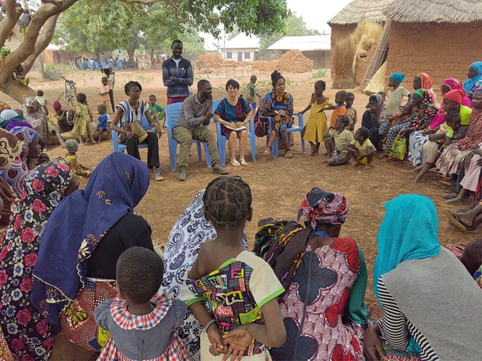 A photograph of a discussion among a group of people in Nyankpala, Ghana.