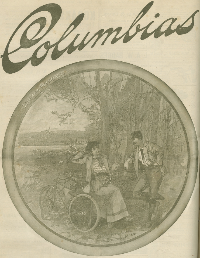 A Columbia Bicycle Advertisement page. It has a drawing of a woman seated on a road-side bench and a man standing near her reclining on the bench, at the foreground. 2 bicycles are near the woman. A winding path is at the left.