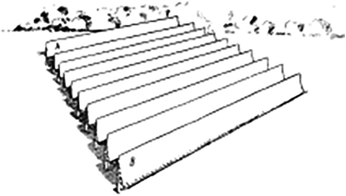 A sketch features ten rectangular bars placed on a surface aligned in rows. The background features irregular structures.