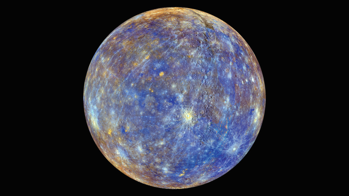 A photograph of the planet Mercury. The Mercury has many circular pits on its surface. Some bright and dark spots are visualized.