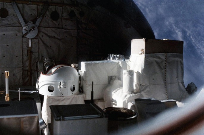 A photograph presents the view of the payload from the Spacelab module, Columbia.