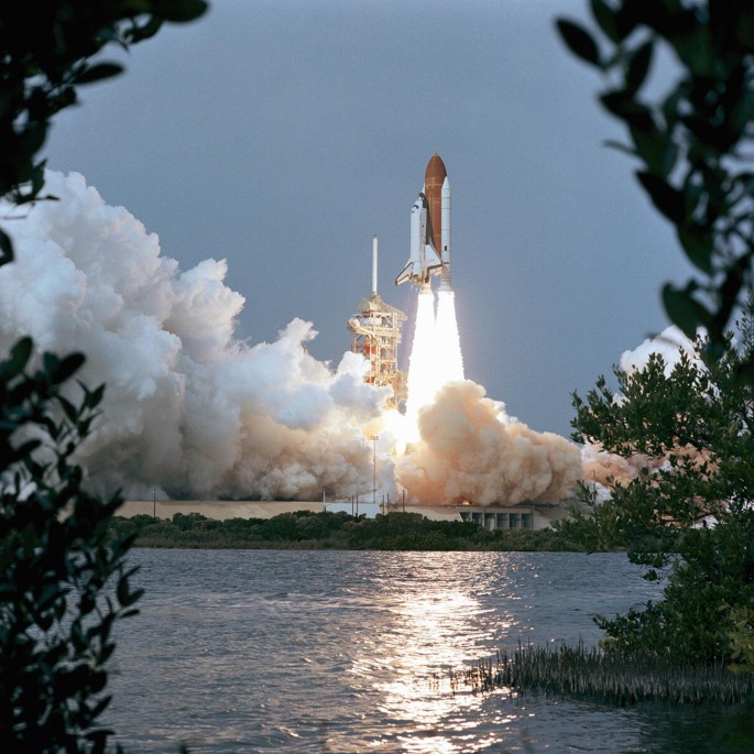 A photograph of the Columbia space shuttle during launch.
